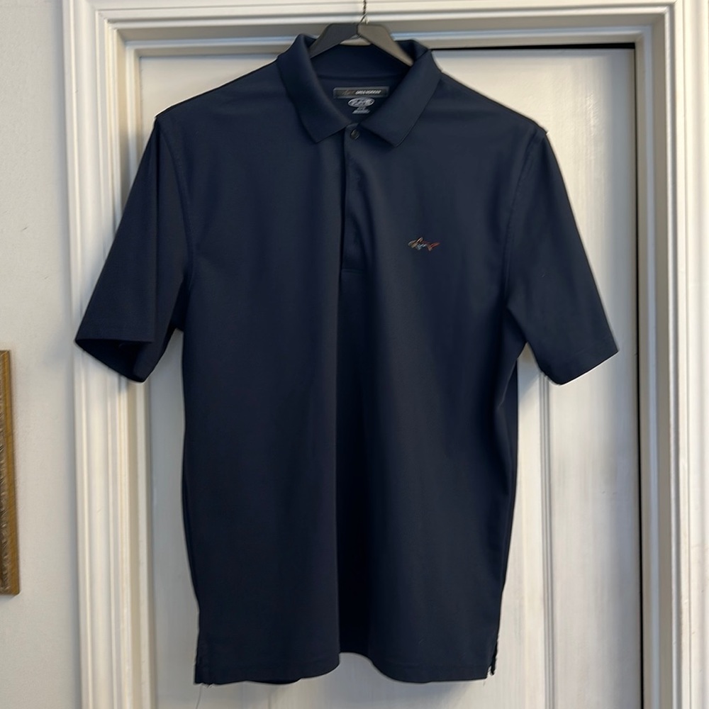 Greg Norman Navy polo. EUC, hardly worn. XL